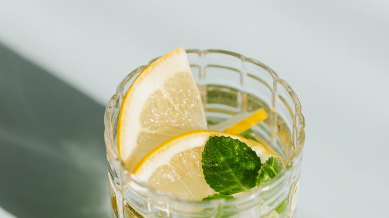 Vitamin D supplement bottle with sunshine in background