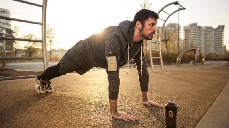 Person doing yoga exercise for stress management
